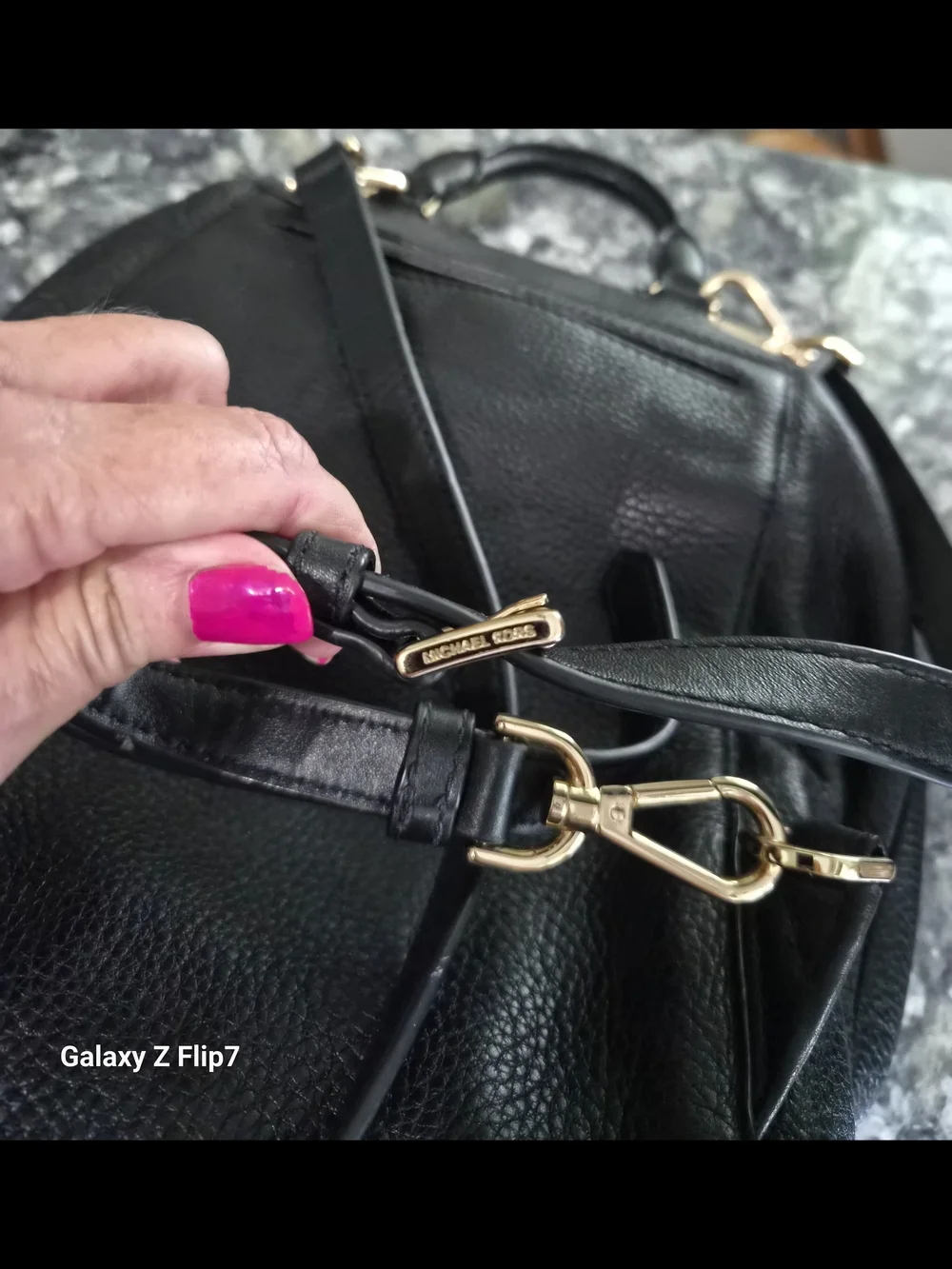 Michael Kors Black Pebbled Leather Backpack with Gold MK Logo